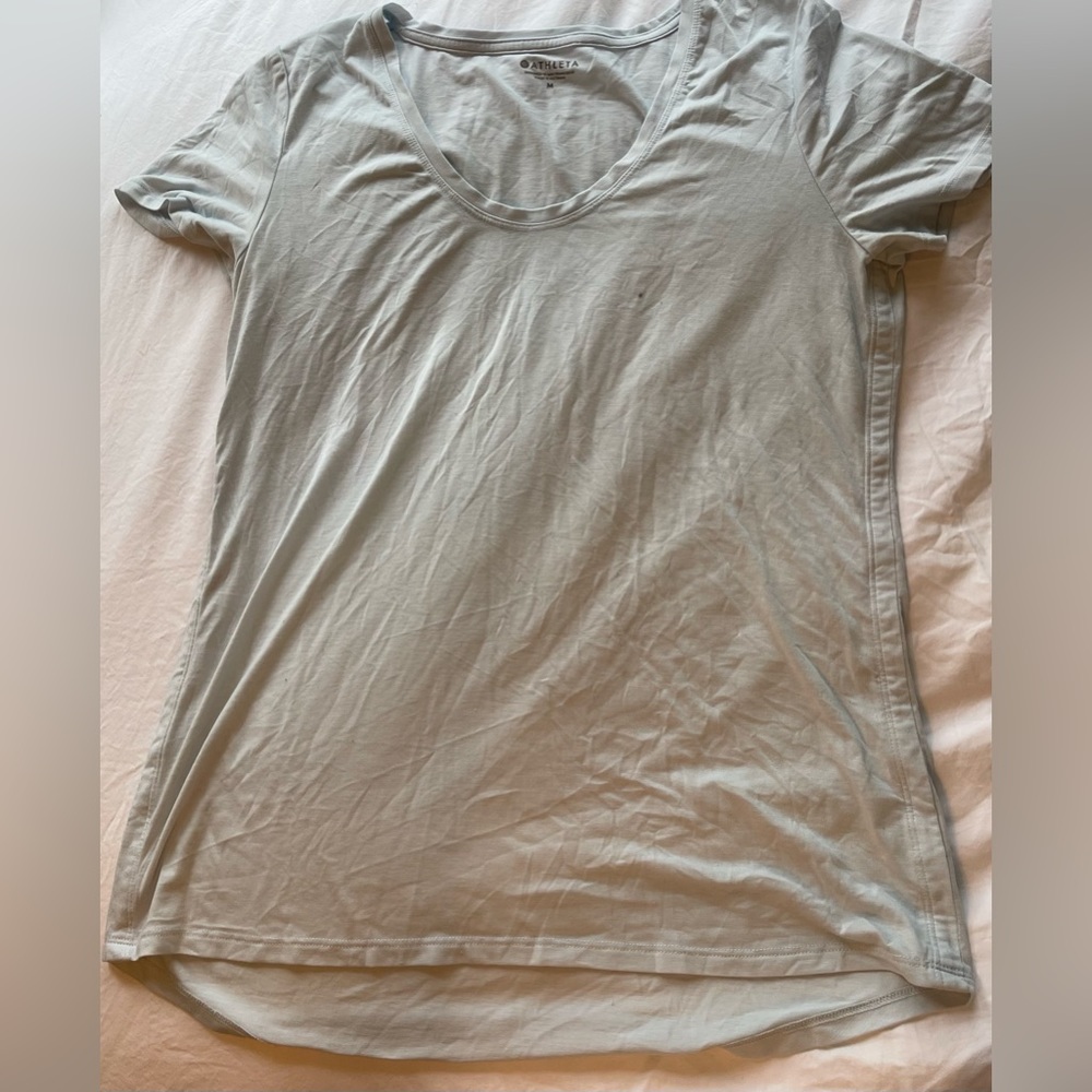 Althleta light- blue shirt, size medium.